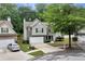 Charming two-story home with a two-car garage, landscaped front yard, and a combination of siding and stone exterior at 3265 Watson Gate Rd, Loganville, GA 30052