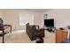 Inviting living room featuring neutral tones and a comfortable sofa at 3265 Watson Gate Rd, Loganville, GA 30052