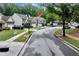 Charming street view showcasing well-maintained homes and lush greenery, perfect for a peaceful suburban lifestyle at 3265 Watson Gate Rd, Loganville, GA 30052