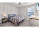 Cozy bedroom with natural light and neutral colors at 3560 Summerpoint Xing, Cumming, GA 30028