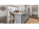 Modern kitchen featuring stainless steel appliances, granite countertops, and a spacious island at 3560 Summerpoint Xing, Cumming, GA 30028