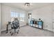 Office space with rolling desk chair, printer, and natural light at 3560 Summerpoint Xing, Cumming, GA 30028