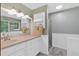 Bright bathroom with double vanity, lots of storage, and a tub at 3663 Homewood Trl, Powder Springs, GA 30127