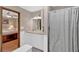Full bathroom with tub/shower combo and large vanity area, access to bedroom at 3663 Homewood Trl, Powder Springs, GA 30127