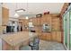 Well-equipped kitchen with granite countertops, modern appliances, and a breakfast bar at 3663 Homewood Trl, Powder Springs, GA 30127