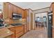 Kitchen area with granite countertops and stainless steel appliances adjacent to dining area at 3663 Homewood Trl, Powder Springs, GA 30127
