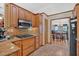 Well-lit kitchen with gas range, granite countertops, tile backsplash and stainless steel appliances at 3663 Homewood Trl, Powder Springs, GA 30127