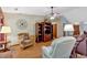 Comfortable living room with built-in shelves, ceiling fan, and neutral tones at 3663 Homewood Trl, Powder Springs, GA 30127