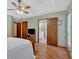 Spacious main bedroom with a ceiling fan and ensuite bathroom at 3663 Homewood Trl, Powder Springs, GA 30127