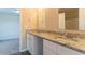 Bathroom features granite counters, double sinks, and white cabinets at 4417 Roche St, Atlanta, GA 30349