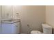 Simple bathroom with granite countertop and white cabinets and fixtures at 4417 Roche St, Atlanta, GA 30349