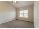 Bright bedroom with vaulted ceiling, large window and neutral carpet at 4417 Roche St, Atlanta, GA 30349