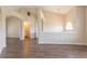 Expansive living area with elegant arched doorways and sleek, modern flooring throughout at 4417 Roche St, Atlanta, GA 30349
