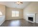 Bright and spacious living room featuring wood floors and cozy fireplace at 4417 Roche St, Atlanta, GA 30349