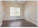 Bright room with a large window and modern flooring, offering a versatile space at 4417 Roche St, Atlanta, GA 30349