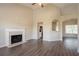 Bright living room features a fireplace, wood floors, and an open layout at 4417 Roche St, Atlanta, GA 30349
