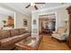 Open-concept living room flows seamlessly into the dining and kitchen areas, perfect for entertaining at 11715 Dancliff Trce, Alpharetta, GA 30009