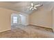 Spacious bedroom with vaulted ceiling, fan and neutral carpet at 1405 Bramlett Forest Trl, Lawrenceville, GA 30045