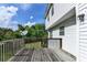 Wooden deck offering a peaceful outdoor view, ideal for unwinding and enjoying the natural surroundings at 1405 Bramlett Forest Trl, Lawrenceville, GA 30045