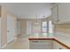 Bright eat-in kitchen with a view of the breakfast nook area, offering additional dining space at 1405 Bramlett Forest Trl, Lawrenceville, GA 30045