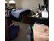 Bedroom with a bed and lots of personal items and furnishings at 185 Windhaven Sw Trl, Atlanta, GA 30331