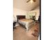 Bedroom with a king bed and vaulted ceiling with a ceiling fan at 185 Windhaven Sw Trl, Atlanta, GA 30331
