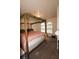 Bedroom with queen bed and arched windows at 185 Windhaven Sw Trl, Atlanta, GA 30331