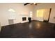 Spacious living room with dark hardwood floors and a white painted brick fireplace at 185 Windhaven Sw Trl, Atlanta, GA 30331