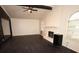 Vaulted living room with dark hardwood floors and a white painted brick fireplace at 185 Windhaven Sw Trl, Atlanta, GA 30331