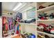 Walk-in closet with ample storage space, shelving, and organized clothing racks at 2195 Edison Ne Ave, Atlanta, GA 30305