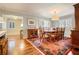 Spacious dining room featuring hardwood floors, a large table, and ample natural light at 2195 Edison Ne Ave, Atlanta, GA 30305