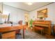 Well-decorated office with a desk, chair, piano, and large windows for natural light at 2195 Edison Ne Ave, Atlanta, GA 30305