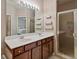 Bathroom with a double vanity, an extra large mirror, and glass shower at 2329 Marion Walk Se Dr # 5, Atlanta, GA 30339