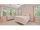 Bright bedroom with large windows, vaulted ceiling, and neutral decor and carpet at 2329 Marion Walk Se Dr # 5, Atlanta, GA 30339