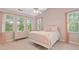 Bright and airy bedroom with a vaulted ceiling and large windows with curtains at 2329 Marion Walk Se Dr # 5, Atlanta, GA 30339