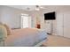 Bedroom showcasing a full closet and access to an en suite bathroom at 2329 Marion Walk Se Dr # 5, Atlanta, GA 30339