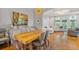 Open dining room with hardwood floors, seamlessly connecting to the living area at 2329 Marion Walk Se Dr # 5, Atlanta, GA 30339