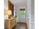 Charming foyer with elegant decor, hardwood floors and a stylish accent cabinet at 2329 Marion Walk Se Dr # 5, Atlanta, GA 30339