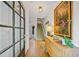 Elegant foyer with hardwood floors, stylish lighting, and contemporary decor at 2329 Marion Walk Se Dr # 5, Atlanta, GA 30339