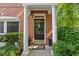 Inviting front entrance with classic columns, elegant door, and manicured landscaping at 2329 Marion Walk Se Dr # 5, Atlanta, GA 30339