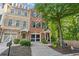 Charming townhome with well-manicured landscaping, front-entry garage, and inviting entrance at 2329 Marion Walk Se Dr # 5, Atlanta, GA 30339