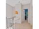 Upstairs hallway featuring white desk and banister leading to rooms at 2329 Marion Walk Se Dr # 5, Atlanta, GA 30339