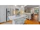 Modern kitchen featuring stainless steel appliances, white cabinetry, and a center island at 2329 Marion Walk Se Dr # 5, Atlanta, GA 30339
