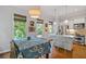 Eat-in kitchen area with table, chairs, and island featuring views of the yard at 2329 Marion Walk Se Dr # 5, Atlanta, GA 30339
