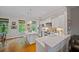 Bright kitchen with white cabinets, stainless appliances, and stylish breakfast bar at 2329 Marion Walk Se Dr # 5, Atlanta, GA 30339