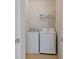 Laundry room with washer, dryer and shelf at 2329 Marion Walk Se Dr # 5, Atlanta, GA 30339