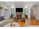 Cozy living room with fireplace, recessed lighting, and stylish decor at 2329 Marion Walk Se Dr # 5, Atlanta, GA 30339