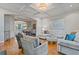 Open-concept living room featuring hardwood floors and coffered ceilings at 2329 Marion Walk Se Dr # 5, Atlanta, GA 30339