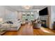 Spacious living room with hardwood floors, coffered ceilings, fireplace, and ample natural light at 2329 Marion Walk Se Dr # 5, Atlanta, GA 30339