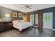 Spacious main bedroom with hardwood floors, ceiling fan and beautiful natural light at 2329 Marion Walk Se Dr # 5, Atlanta, GA 30339